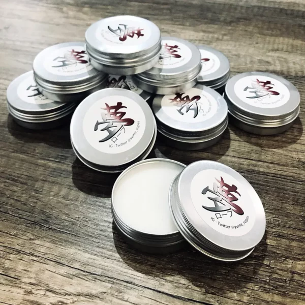 petits pots de wax pour l'entretient des cordes